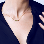 Load image into Gallery viewer, Gold plated steel pendant with 3 peridots