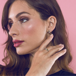 Load image into Gallery viewer, Silver and peridot earring set in the shape of an X