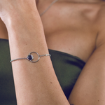 Load image into Gallery viewer, Silver and lava bracelet with double circle