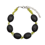 Load image into Gallery viewer, Lava and peridot bracelet