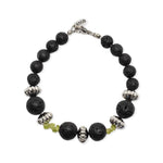 Load image into Gallery viewer, Round lava bracelet, silver and peridot cylinders