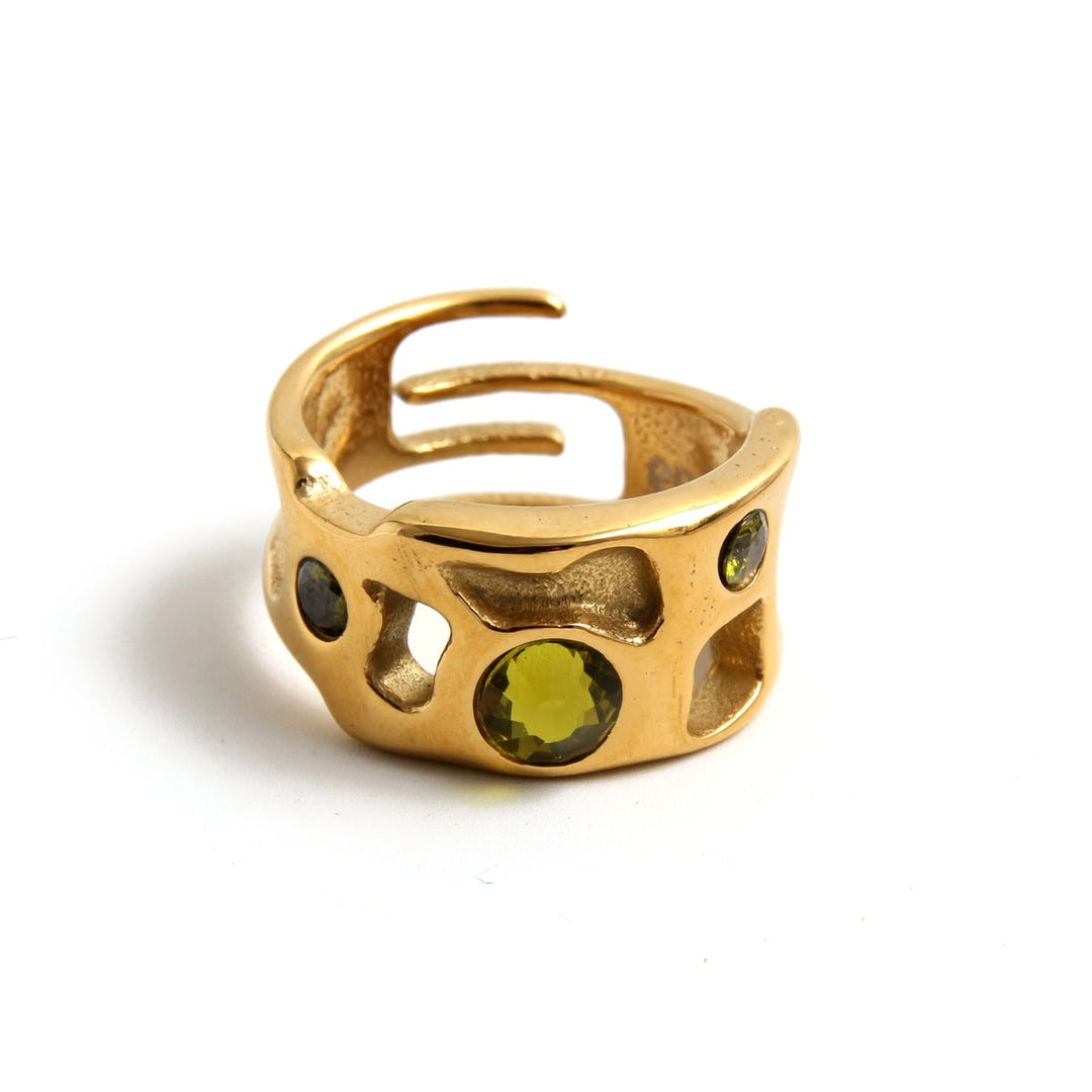 Anillo acero baño oro olivina rígido