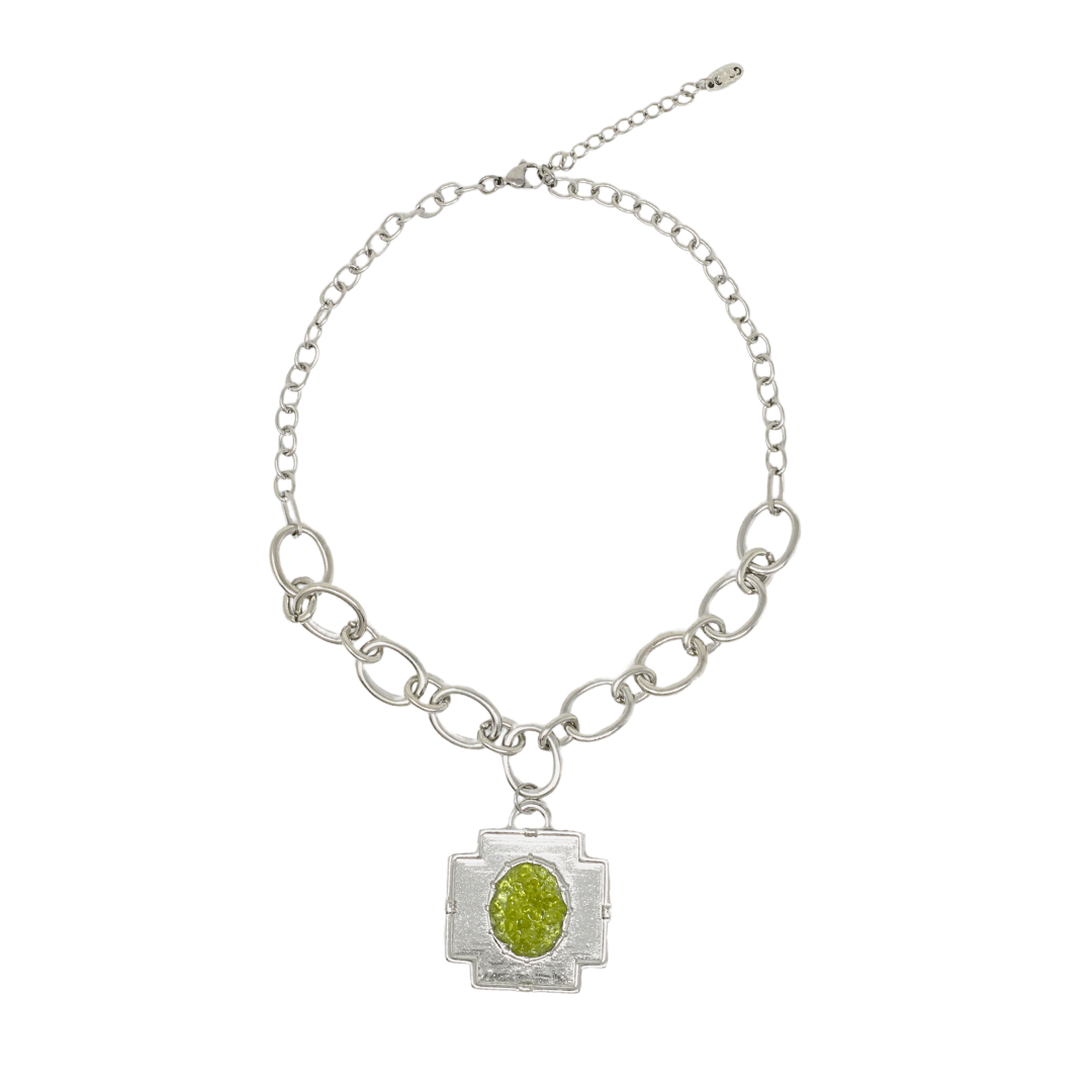 Large peridot cross chain pendant