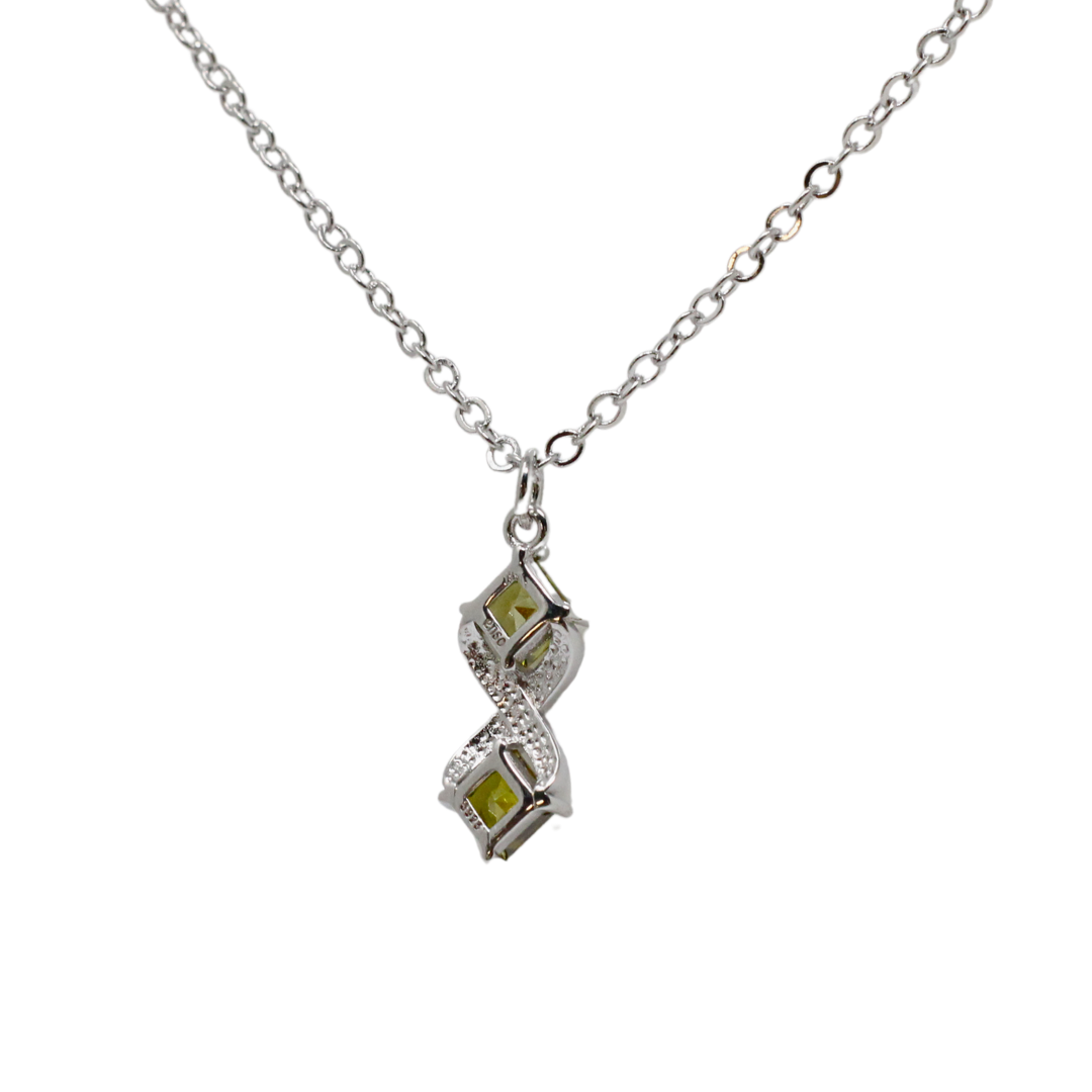 Silver and peridot pendant set