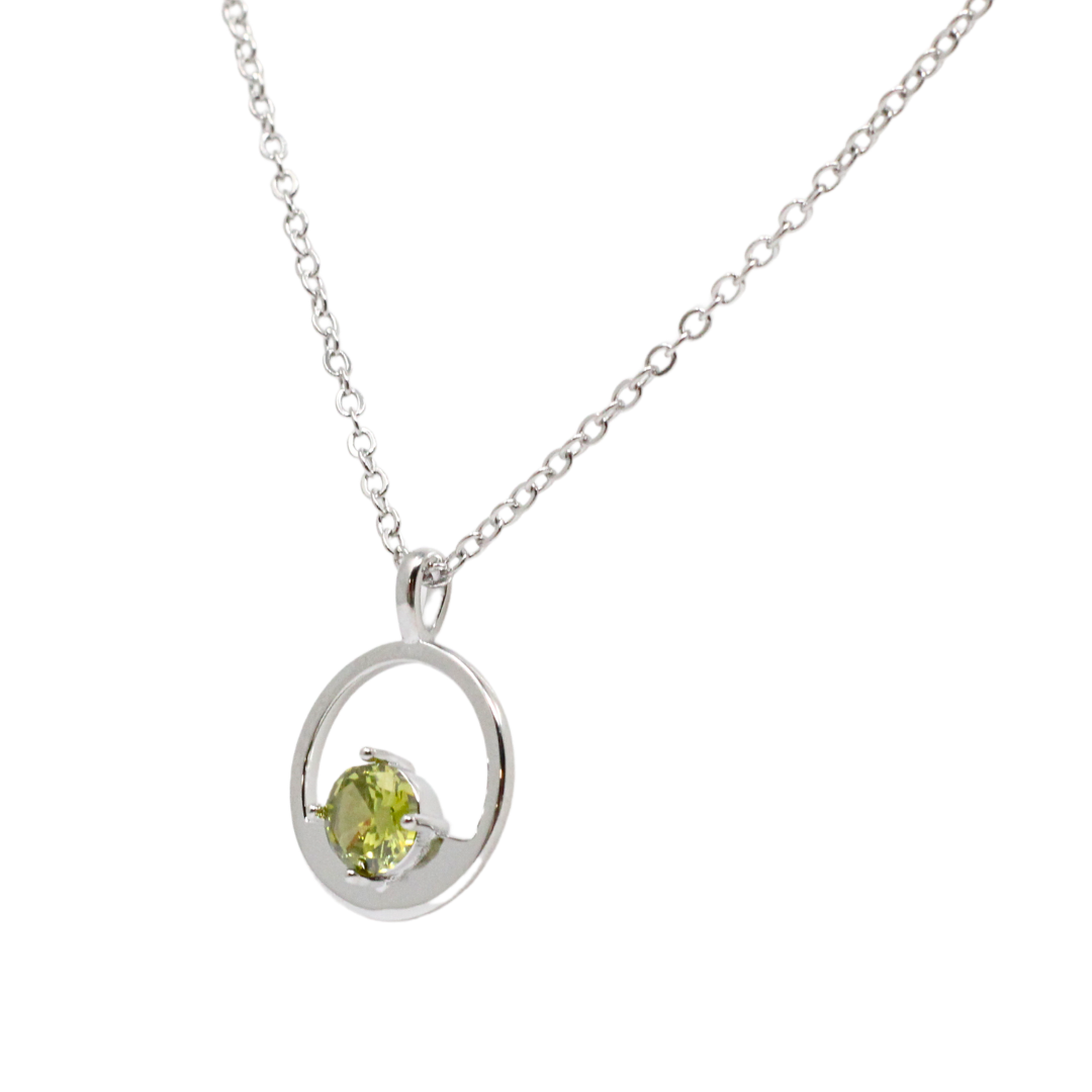 Silver and peridot circle pendant