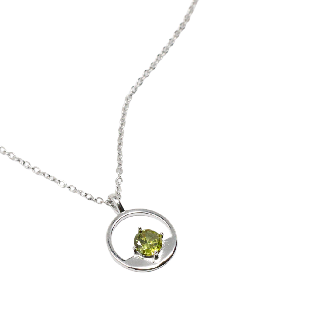 Silver and peridot circle pendant