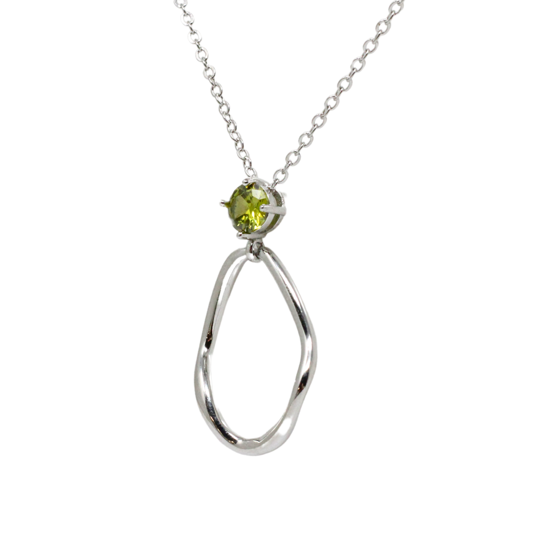 Silver and peridot pendant set