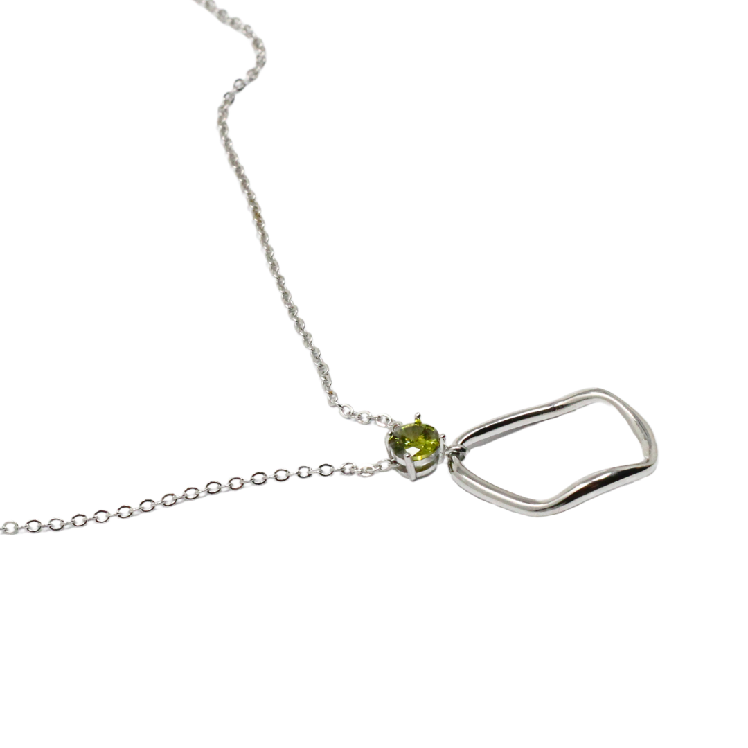 Silver and peridot pendant set