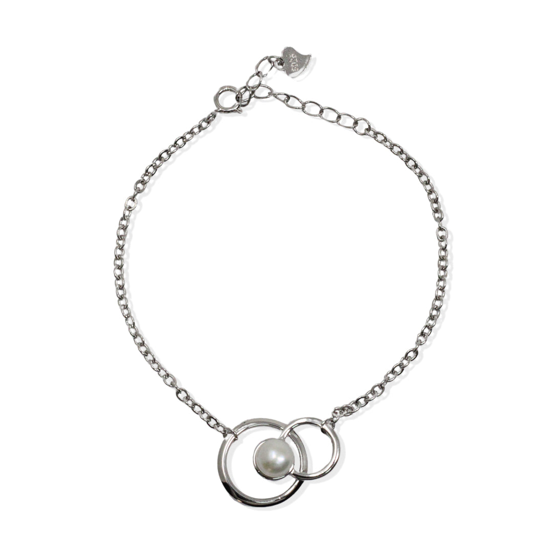 Silver bracelet with double circle of pearls