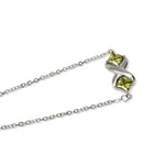 Load image into Gallery viewer, Silver Bracelet with Peridot Set in X Design
