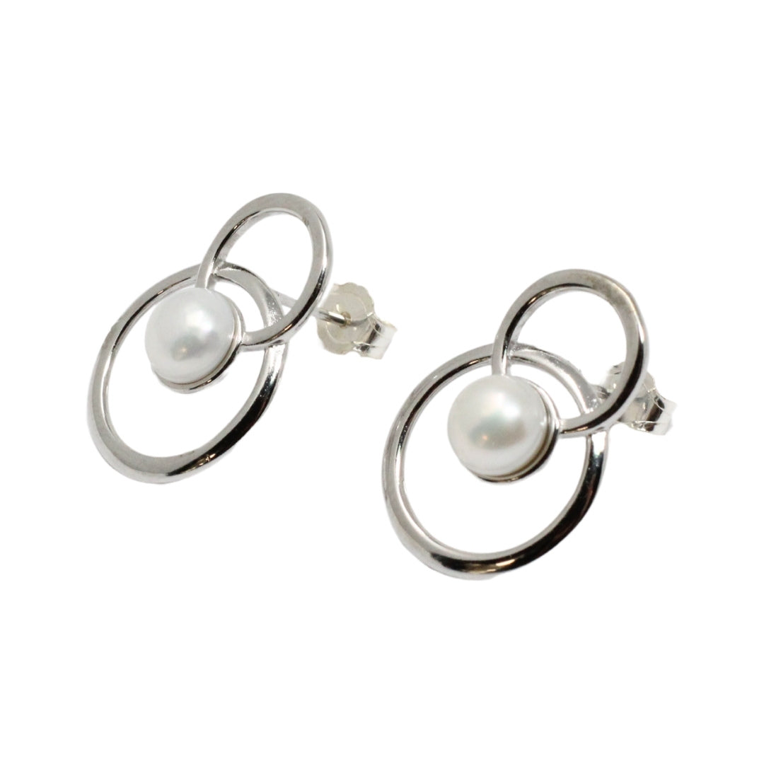 Silver and pear earring with double circle