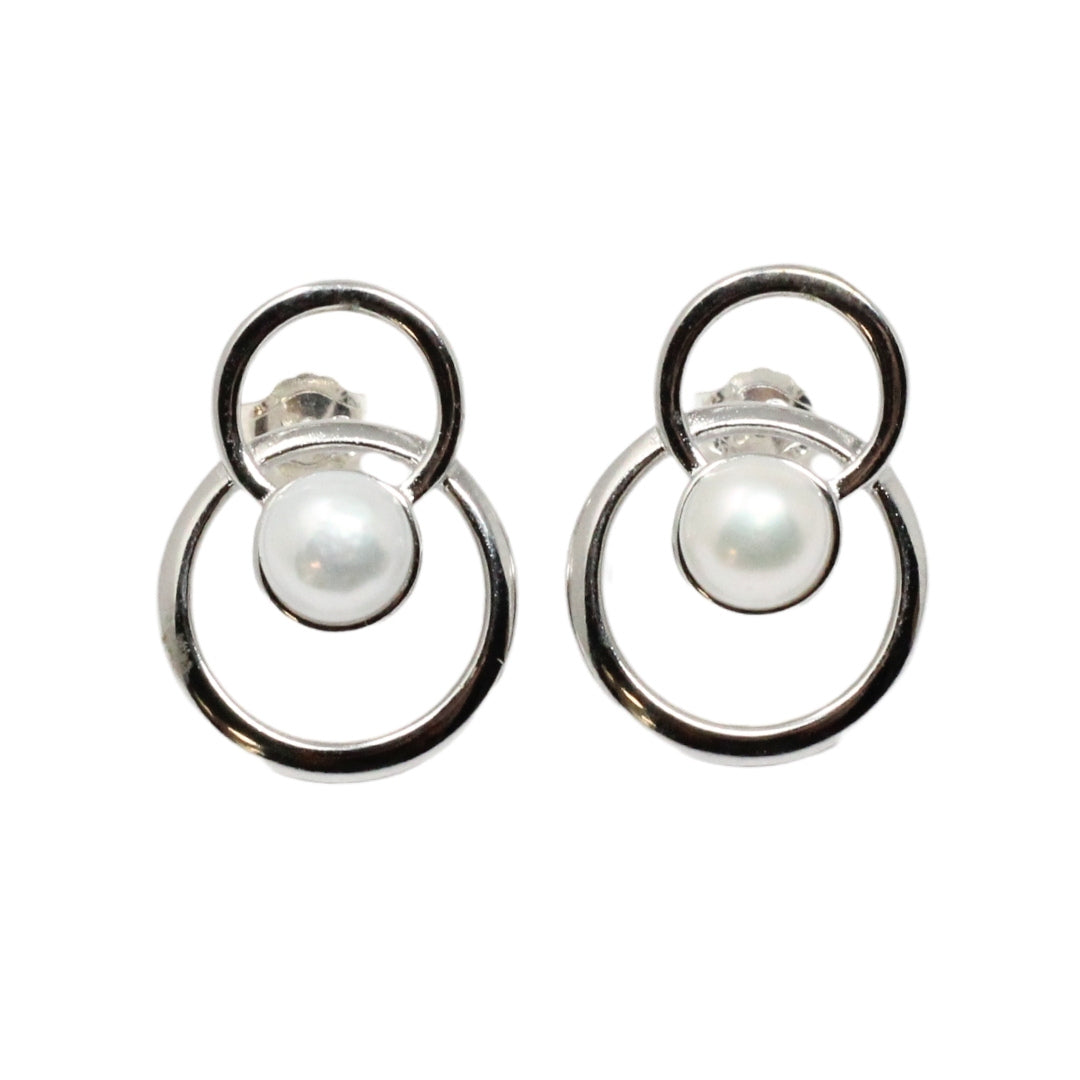 Silver and pear earring with double circle