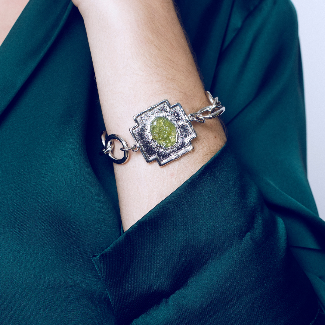 Peridot cross chain bracelet